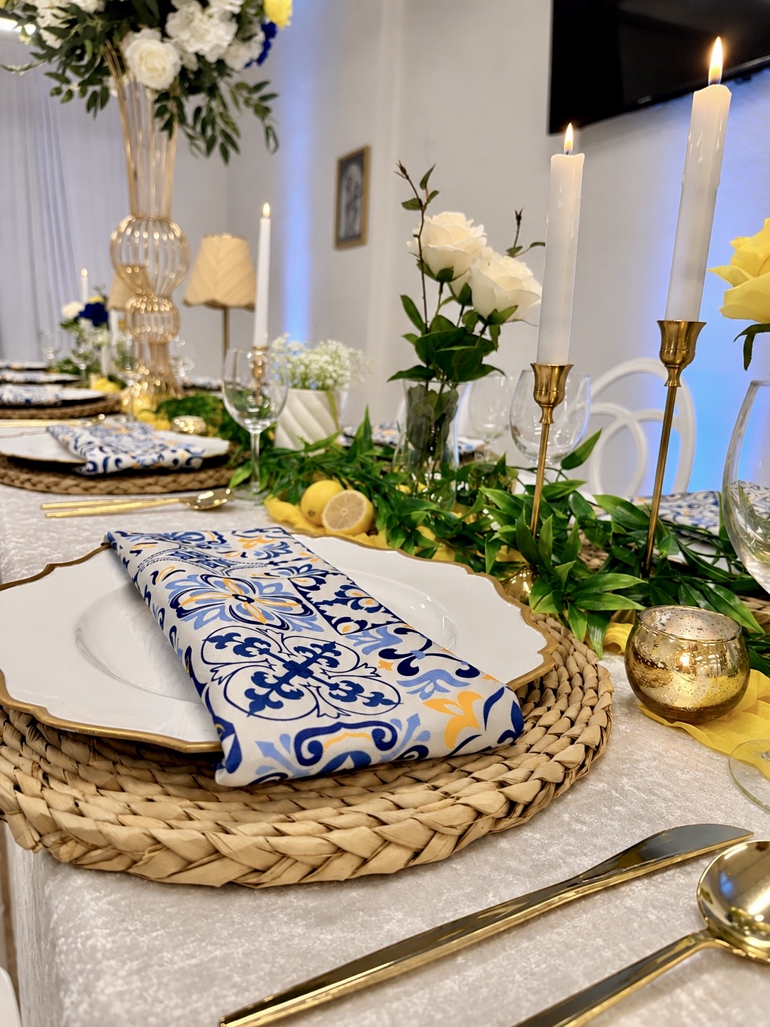 Gold flatware and patterned napkin